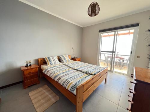 A bed or beds in a room at Casa Vista Pájaro