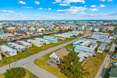 an aerial view of a city with houses at Delight on Davis in Atlantic Beach
