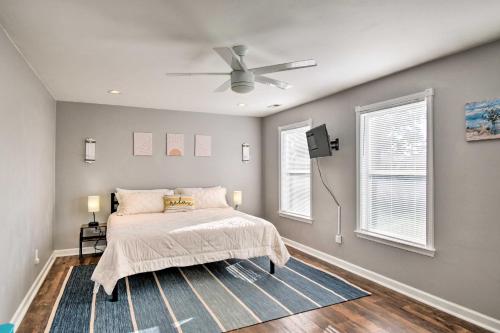 a bedroom with a bed and a ceiling fan at Norfolk Beach House Rental with Private Pool! in Norfolk
