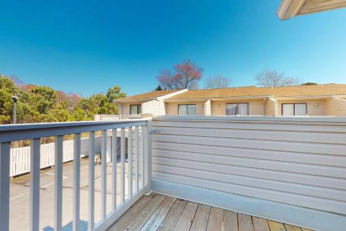 a privacy fence on a deck in front of a house at Sea Pines Village --- 8 Sea Pines Village in Bethany Beach