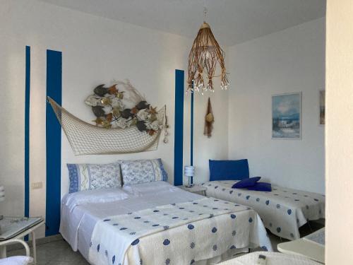 A bed or beds in a room at B&B Mare E Natura
