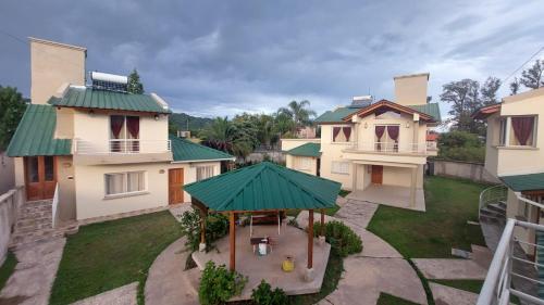 an aerial view of a house with a green roof at La Glorieta -Casas de descanso in San Salvador de Jujuy