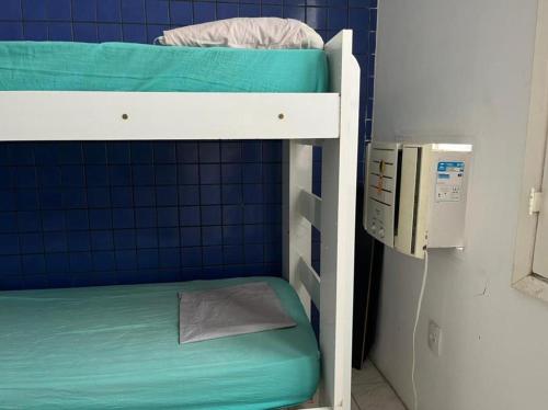 a couple of bunk beds in a room at Pousada Linda In Ipanema in Rio de Janeiro