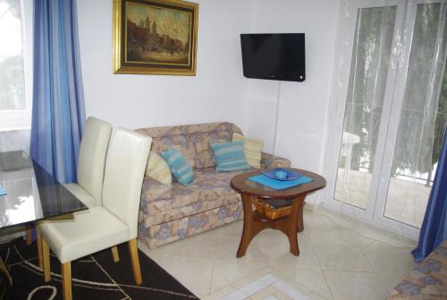 Μια τηλεόραση ή/και κέντρο ψυχαγωγίας στο Apartment Petar