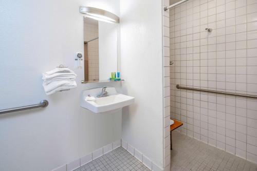 a bathroom with a sink and a mirror at Motel 6-Ventura, CA - Beach in Ventura