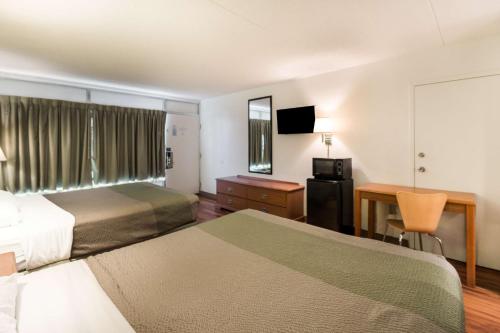 Postel nebo postele na pokoji v ubytování Motel 6-Pulaski, TN
