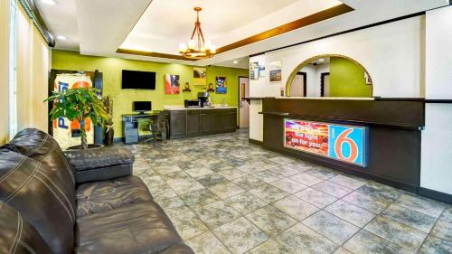 a waiting room with a leather couch in a hospital at Lakeside Inn Lake Havasu City in Lake Havasu City