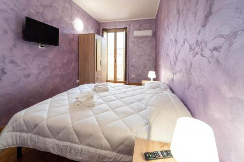 Postel nebo postele na pokoji v ubytování B&B Sasso