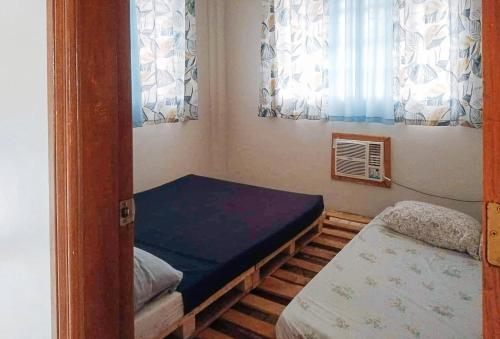 Postel nebo postele na pokoji v ubytování RedDoorz @ Balai Baibai Cagayan