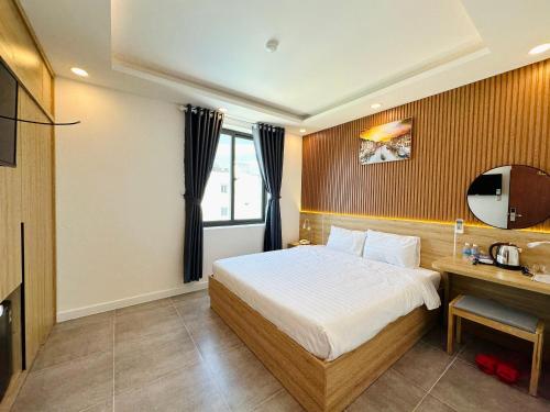Cama o camas de una habitación en Ngọc Anh Hotel