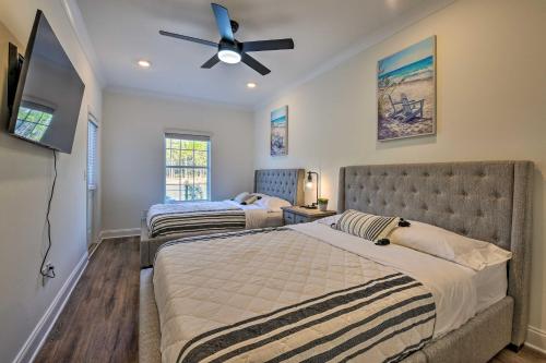 a bedroom with two beds and a ceiling fan at Santa Rosa Beach Vacation Rental Near Ocean! in Santa Rosa Beach
