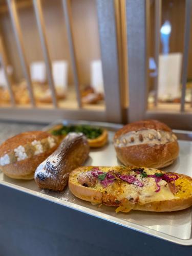 a tray of different types of pastries on a table at MolinHotels501 アクティビティを満喫できる札幌定山渓温泉付き別荘 - W-Bed4&S-6 10persons in Sapporo