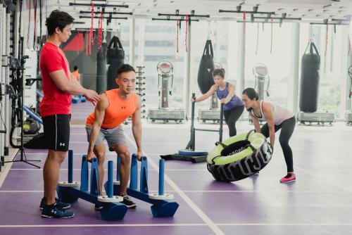 a group of people in a gym at Sofitel Singapore City Centre in Singapore