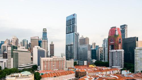 a city skyline with tall skyscrapers at Sofitel Singapore City Centre in Singapore