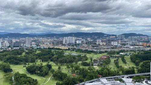 a view of a city with buildings and trees at MOONWAY SUITES At EATON KLCC in Kuala Lumpur