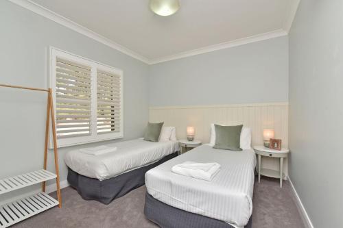 Postel nebo postele na pokoji v ubytování Villa 2br Pinot Grigio Villa located within Cypress Lakes Resort