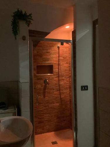 a bathroom with a shower and a sink at Casa Sipontina in Barletta