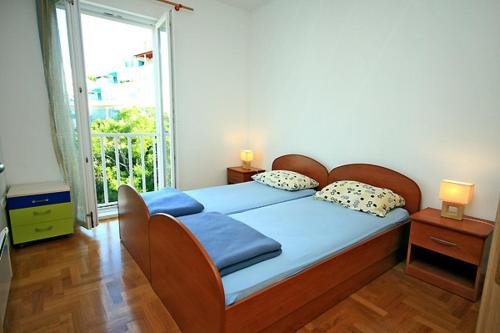 Llit o llits en una habitació de Copacabana Apartment Dubrovnik