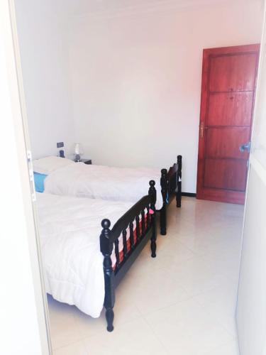 Una cama o camas en una habitación de Hammadi's house
