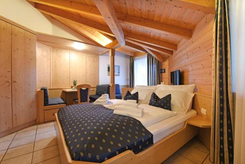 Postel nebo postele na pokoji v ubytování Alpin-Residence Amadeus