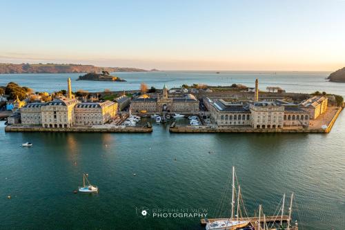 an aerial view of a city in the water at Apartment One - Private Car Park - King Bed - by Ocean City Retreats in Plymouth