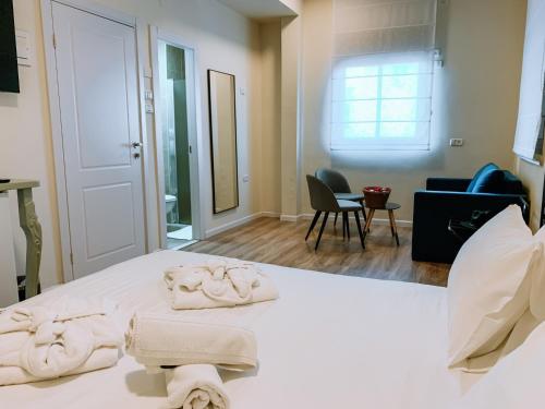 Postel nebo postele na pokoji v ubytování Domus Bat Galim Hotel