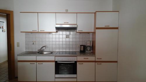 Kuchyň nebo kuchyňský kout v ubytování Apartment Knablhof