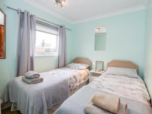 Postel nebo postele na pokoji v ubytování Chalet 12