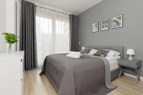 Cozy Apartments with Parking in the 19th District by Noclegi Renters