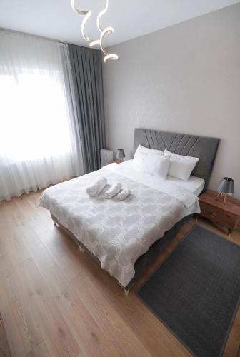 Postel nebo postele na pokoji v ubytování King Suite TH28