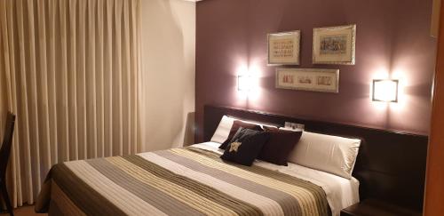Cama o camas de una habitación en Hostal El Lechuguero