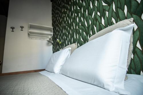 Katil atau katil-katil dalam bilik di Hotel Nella