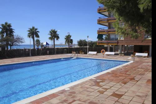 AT041 Els Pins, primera línea de la playa, con piscina