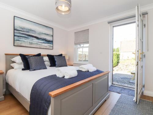 Postel nebo postele na pokoji v ubytování Gweal