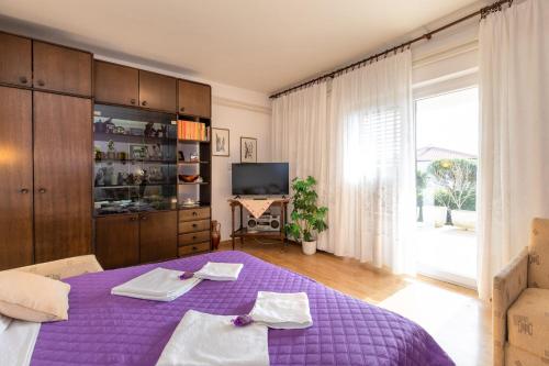 Posteľ alebo postele v izbe v ubytovaní Apartments Lavanda-Kate