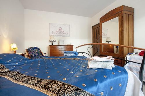 A bed or beds in a room at Passiflora House - Basilicata