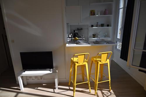 Kuchyňa alebo kuchynka v ubytovaní Cosy Studio