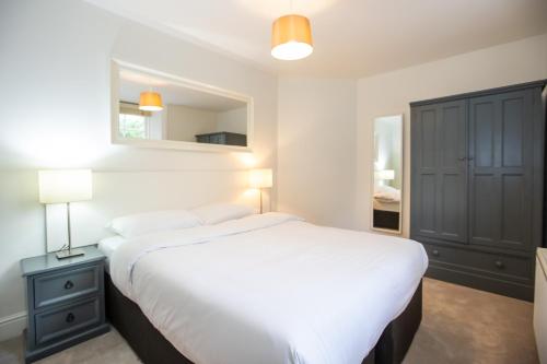 Postel nebo postele na pokoji v ubytování Ballsbridge Apartments