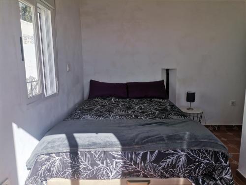 Giường trong phòng chung tại Casita Rural con Encanto