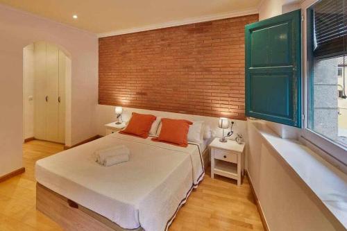 Katil atau katil-katil dalam bilik di Apartamento dúplex en el Barri Vell Girona