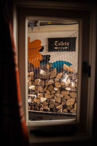 a display window of a pile of cookies at Manorbier Castle Inn Bay Room in Manorbier