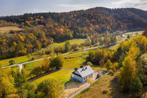 an aerial view of a small house in a field at Antkowe Wzgórze in Polańczyk