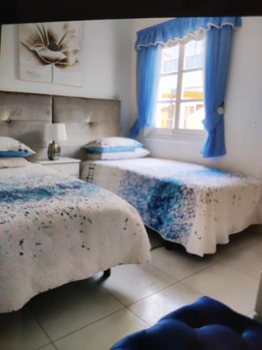 A bed or beds in a room at Penthouse Sabina mit Jacuzzi