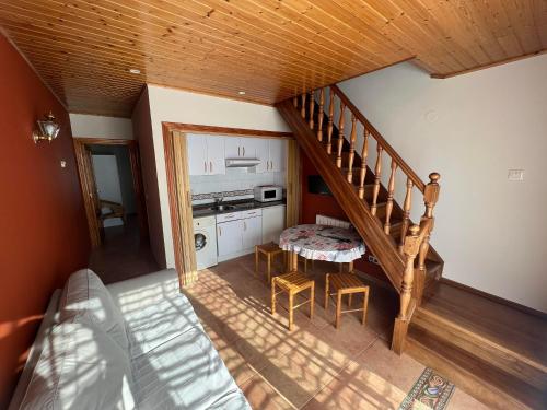an overhead view of a kitchen and stairs in a house at Complejo la Regalina in Cadavedo