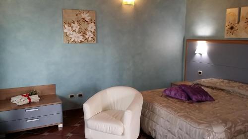 Ένα ή περισσότερα κρεβάτια σε δωμάτιο στο Dolce Vita Relais