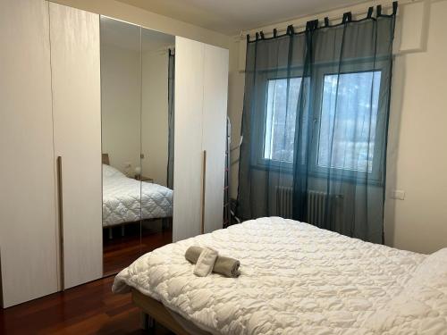 Postel nebo postele na pokoji v ubytování Casa di Gardolo - apartments FREE PARKING