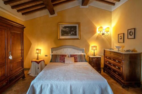 Postel nebo postele na pokoji v ubytování Riparossa Charme apt Adults only