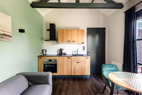 Kuchyň nebo kuchyňský kout v ubytování Zandvoort Lodge