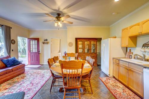 a kitchen and dining room with a table and chairs at Fallbrook Vacation Rental 3 Mi to Wineries! in Fallbrook