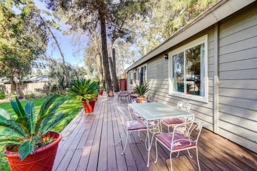 a wooden deck with a table and chairs on it at Fallbrook Vacation Rental 3 Mi to Wineries! in Fallbrook